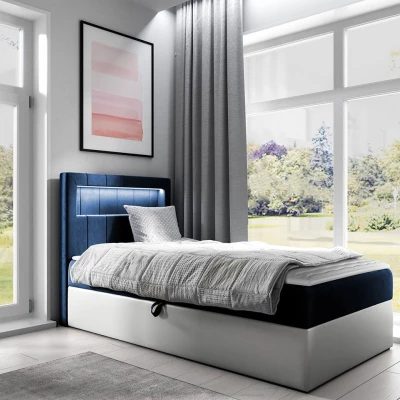 Kontinentální jednolůžková postel 90x200 RAMIRA 1 - bílá ekokůže / modrá 1, pravé provedení + topper ZDARMA