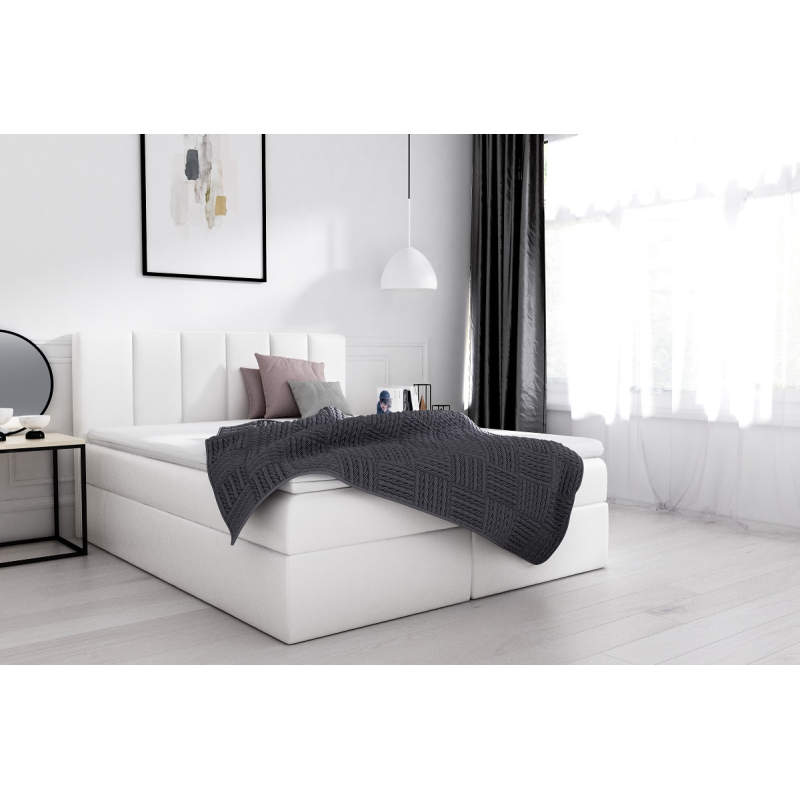 Extravagantní čalouněná postel Sven s úložným prostorem bílá eko kůže 140 x 200