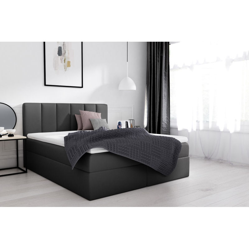 Extravagantní čalouněná postel Sven s úložným prostorem černá eko kůže 140 x 200 + topper